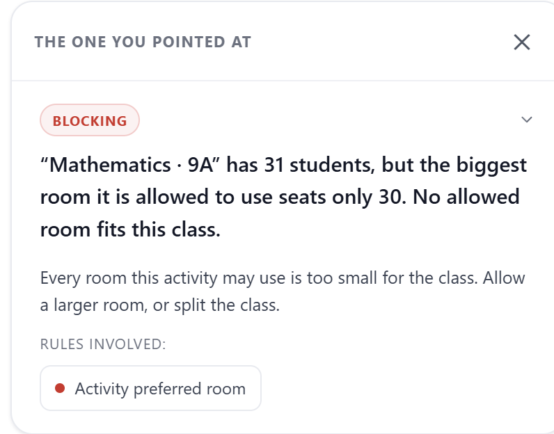 One finding, opened: the class has 31 students, and the biggest room it may use seats 30. The rule involved is named